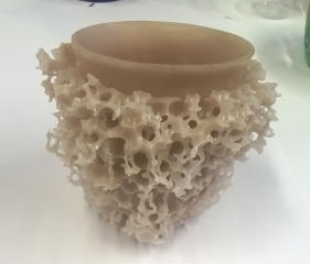 Wax cup with wax design from gel beads.